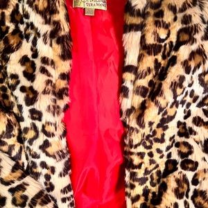 Princess Vera faux cheetah. Sz xs. 26” sleeve, shawl collar. Red poly lining